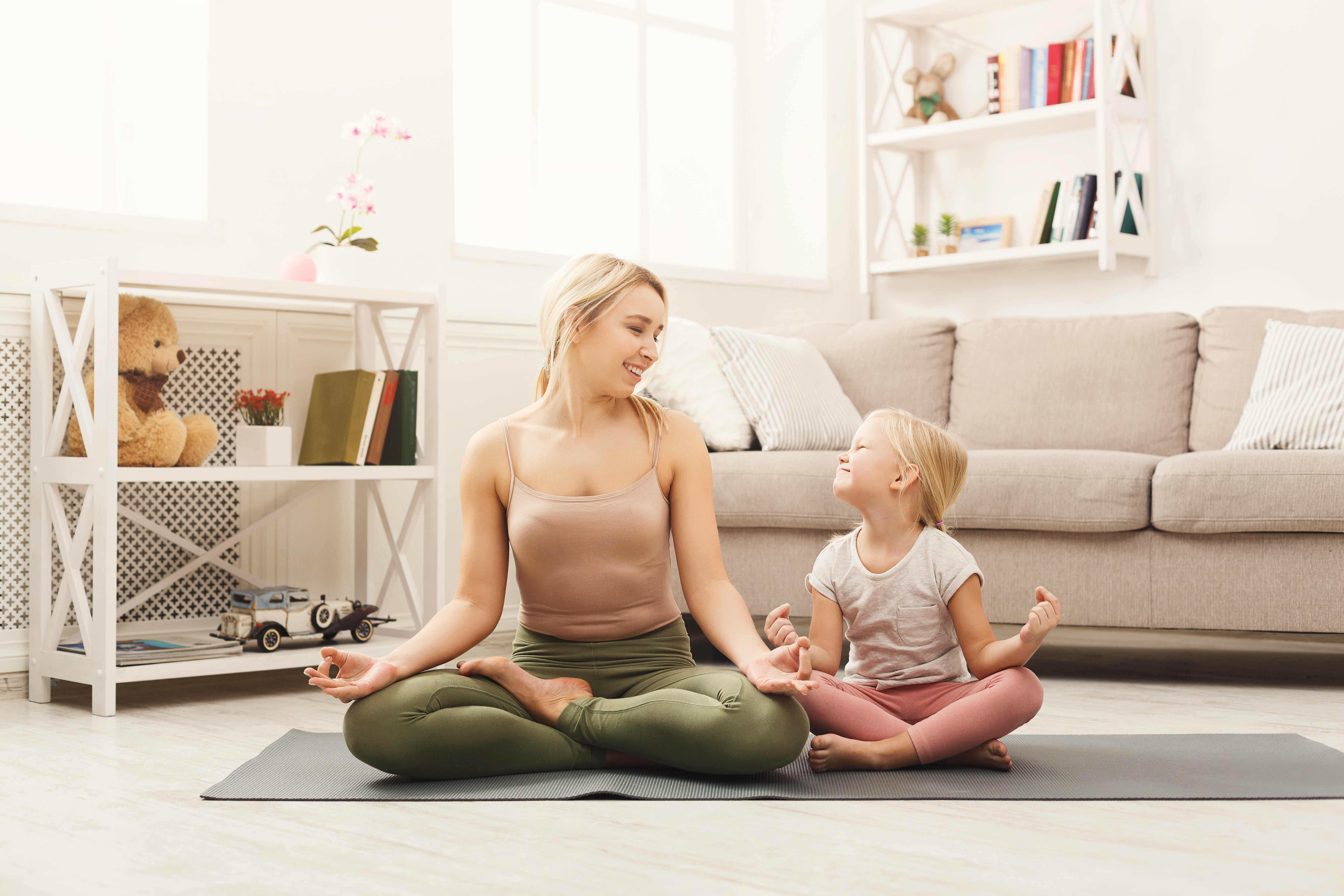 Mom and Daughter doing yoga